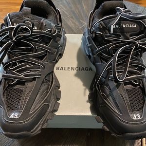 Balenciaga Track shoe is good condition.  Box included but, damaged slightly